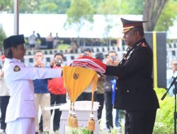 Kapolres Jayapura Pimpin Upacara Penurunan Bendera Merah Putih