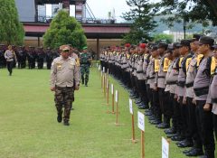 PJ. Bupati Pimpin Gelar Pasukan Pengamanan Pemungutan Suara Pilkada Serentak 2024 Polres Jayapura